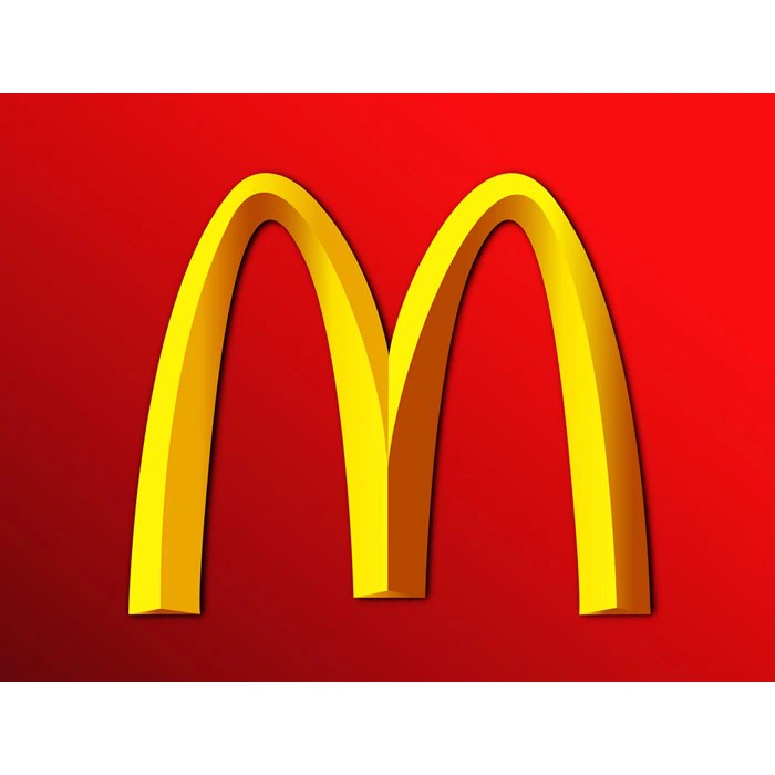 Gult McDonalds Golden Arches-logo på rød baggrund.